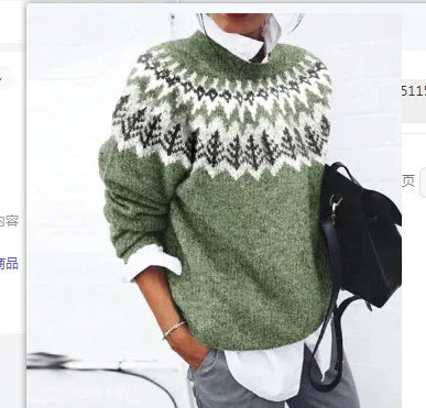 Person wearing green and white patterned knitted sweater over white shirt, carrying black shoulder bag