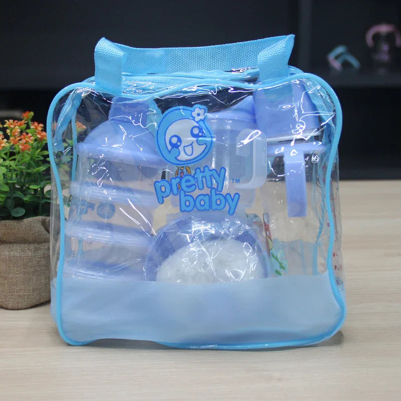 Clear baby feeding kit bag with blue handles and compartments including bottles and formula container