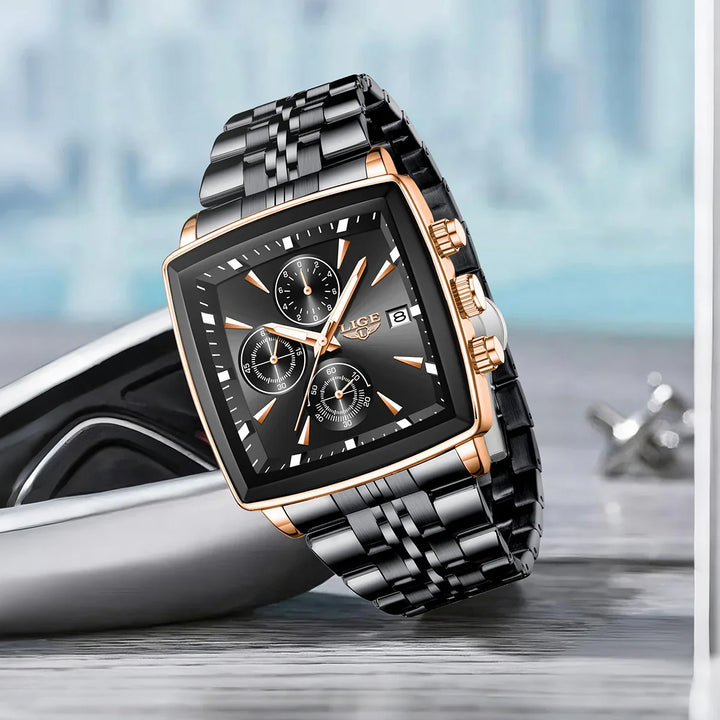 Black and gold LIGE chronograph wristwatch with square dial and metal bracelet on wooden surface