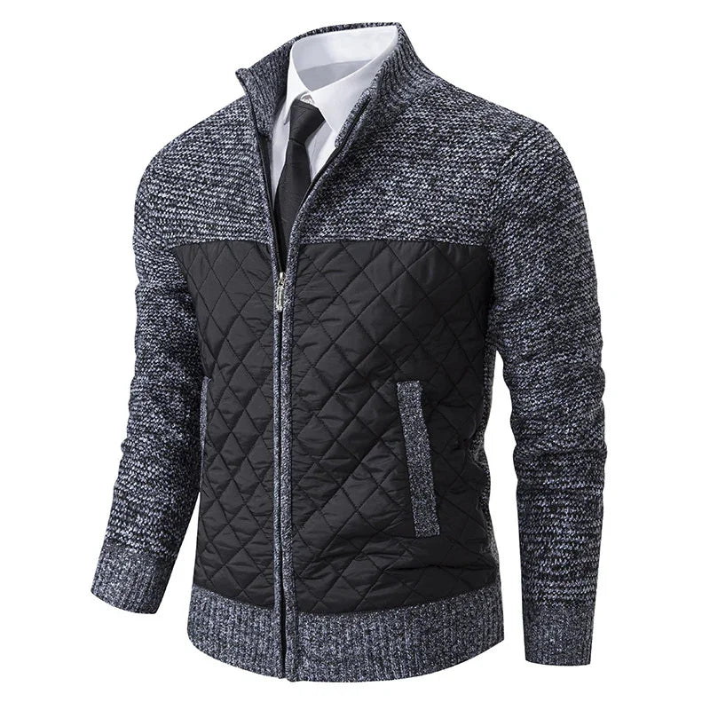 Men's grey and black quilted knit zip-up jacket with collar, worn over white shirt and black tie