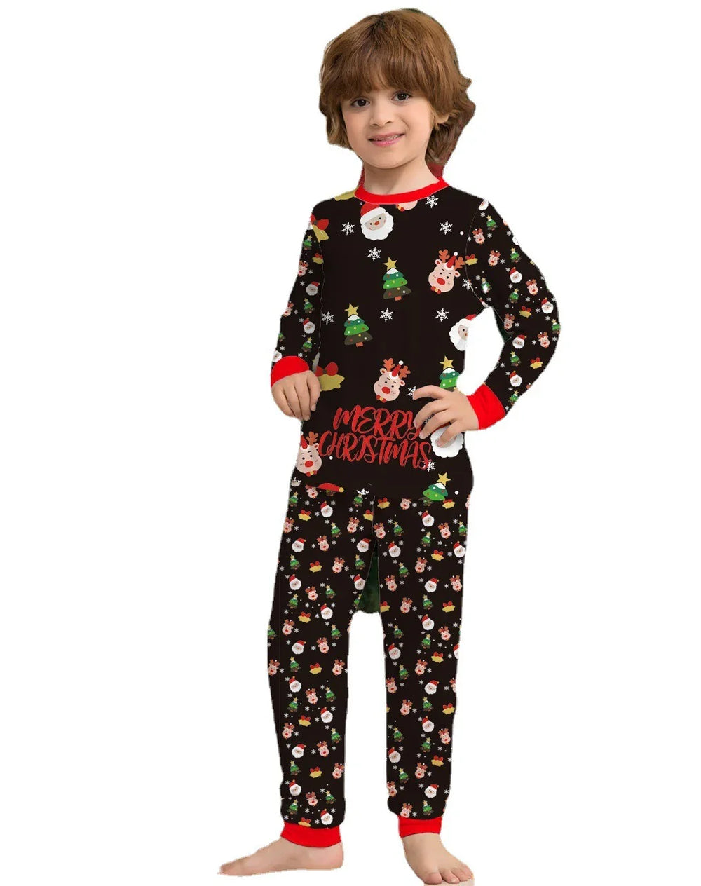 Child wearing black Christmas pajamas with Santa, reindeer, trees, and Merry Christmas text