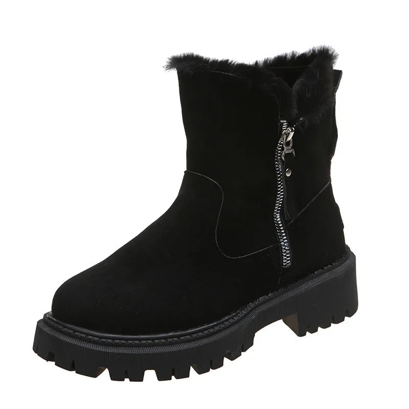 Black suede winter boot with fur lining and side zipper on rugged sole