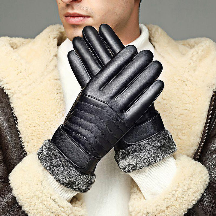 Man wearing black leather gloves with fur cuffs and a shearling jacket