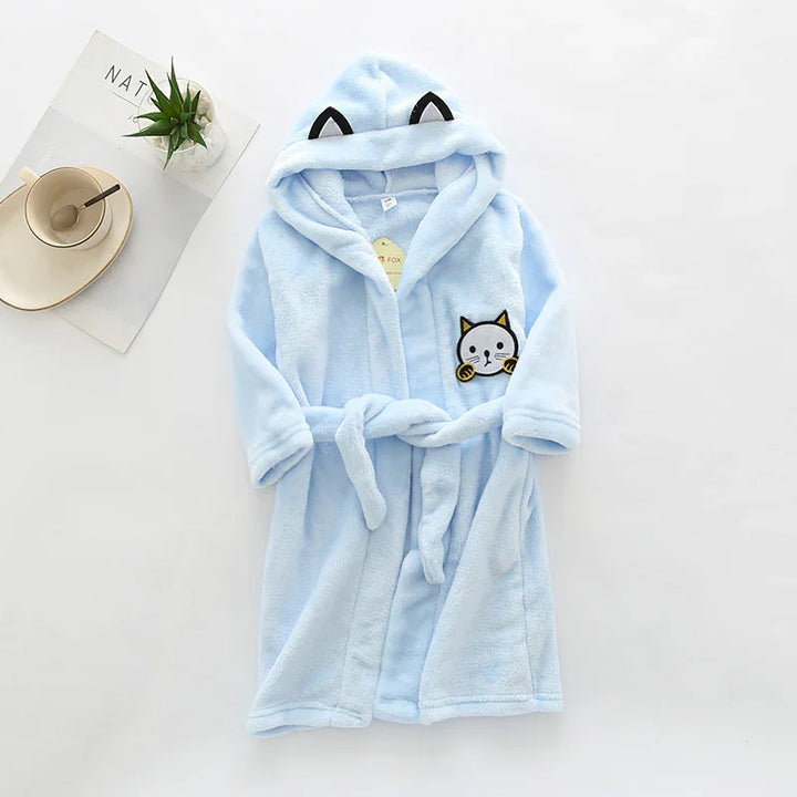 Light blue children's hooded bathrobe with cat ears and cat face design on pocket, soft plush fabric