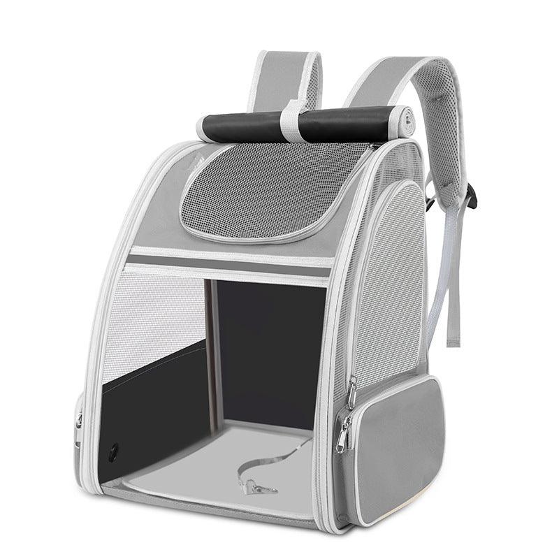 Gray pet carrier backpack with mesh panels, padded straps, and side pockets for small pets
