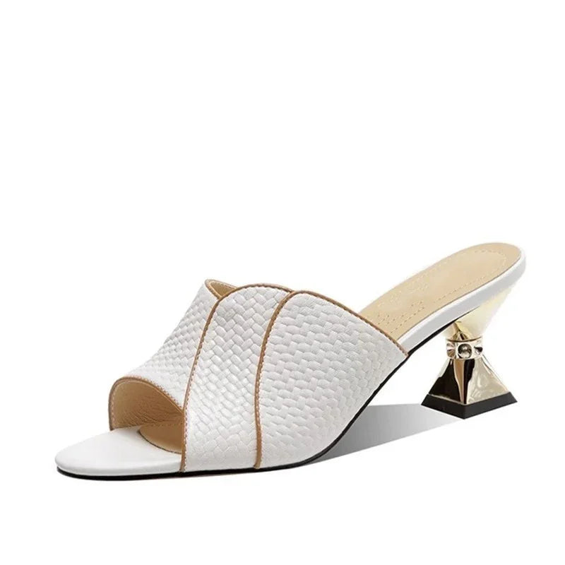 White open-toe mule sandal with textured upper and gold geometric block heel