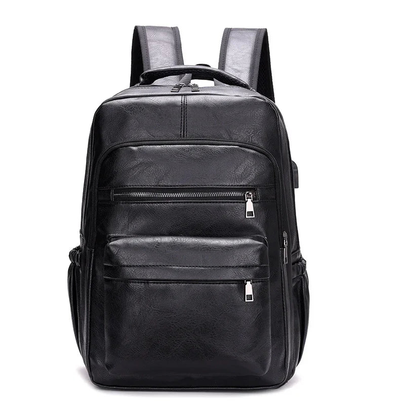 Black leather backpack with multiple zippered pockets and padded shoulder straps