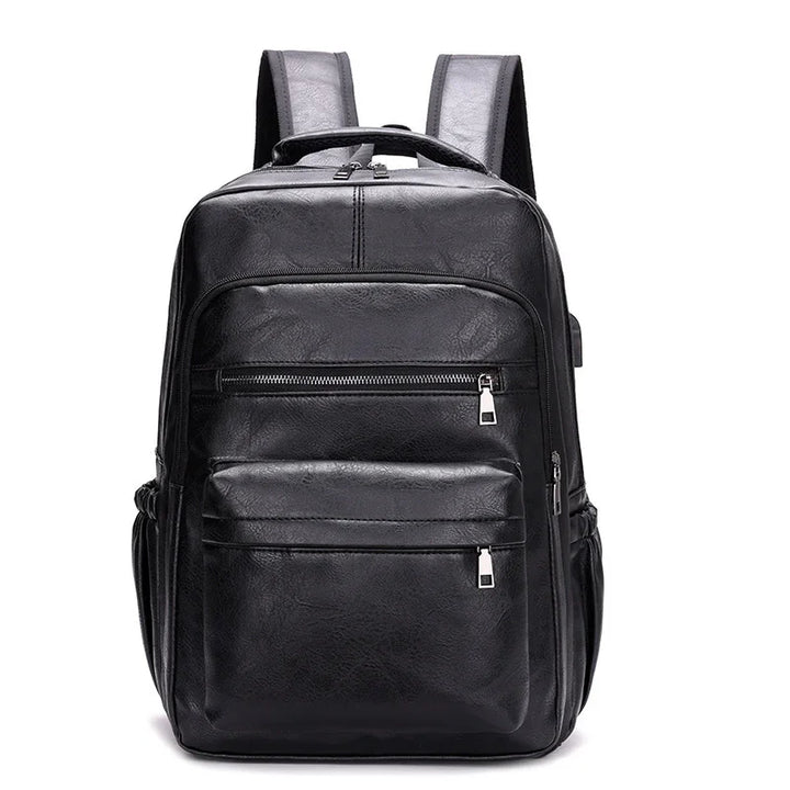 Black leather backpack with multiple zippered pockets and padded shoulder straps