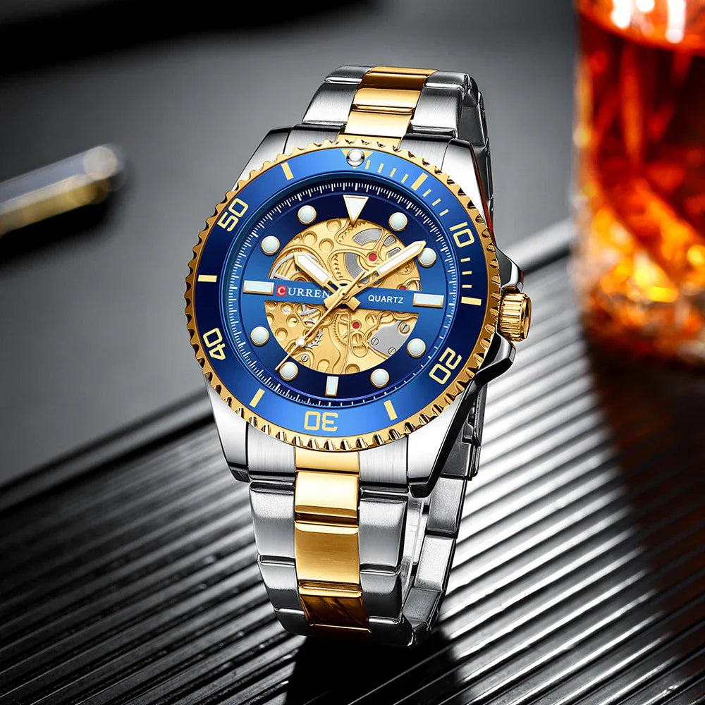 Luxury wristwatch with blue and gold dial, skeleton gears, and silver-gold metal band