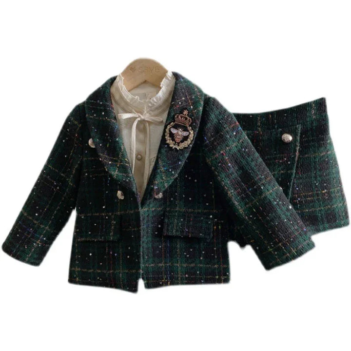 Children's dark green plaid tweed jacket with a white embroidered bee patch and matching skirt