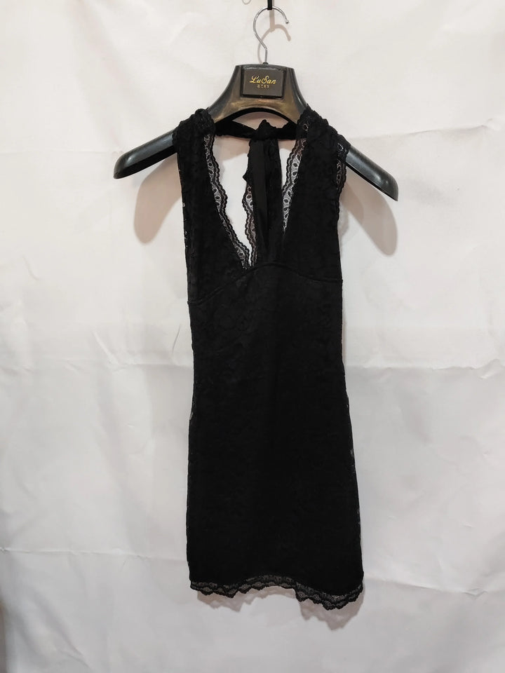 Black lace sleeveless dress with deep V-neckline hanging on LuSan branded hanger against white background