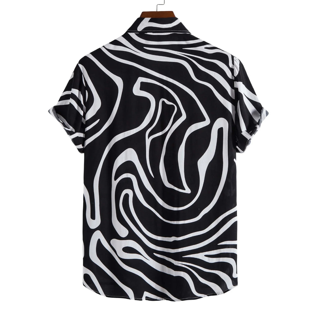 Black and white short sleeve shirt with abstract swirl pattern hanging on wooden hanger