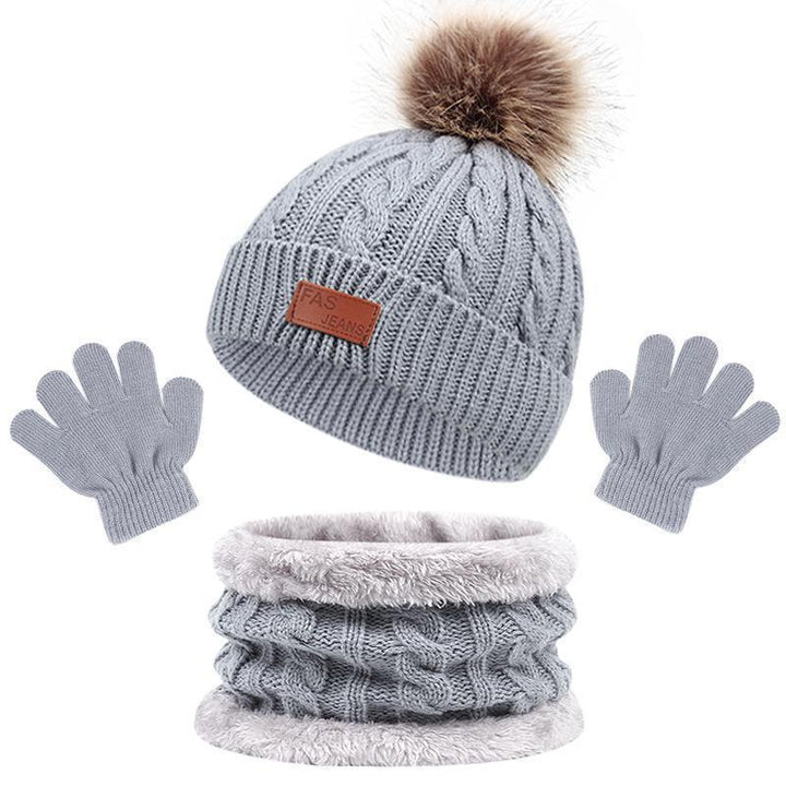 Gray knitted winter set with pom pom beanie, gloves, and fleece-lined neck warmer