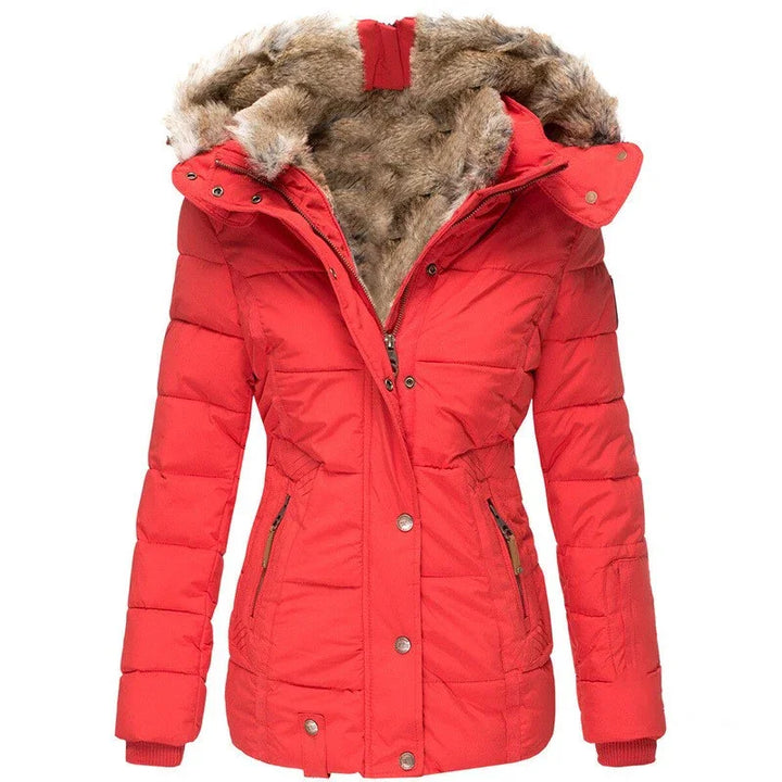 Red women's winter jacket with faux fur-lined hood and zipper pockets on white background