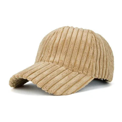 Beige corduroy baseball cap with ribbed texture and curved brim