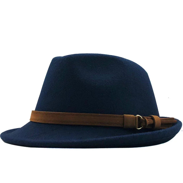 Navy blue fedora hat with a brown leather strap and buckle detail