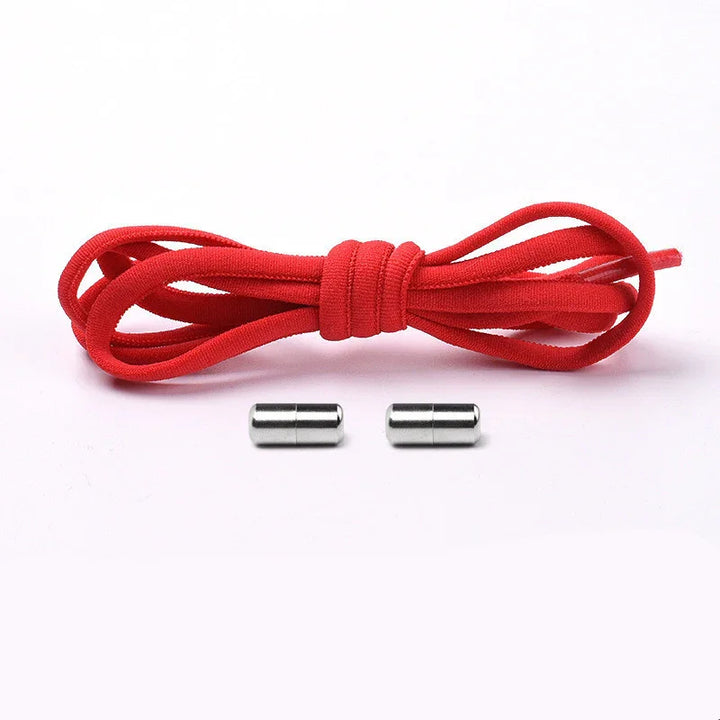 Red elastic shoelace with two silver metal aglets on a white background