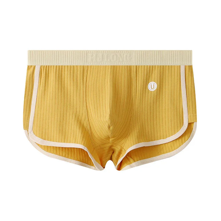 Yellow ribbed men’s boxer briefs with beige waistband and trim, comfortable stylish underwear