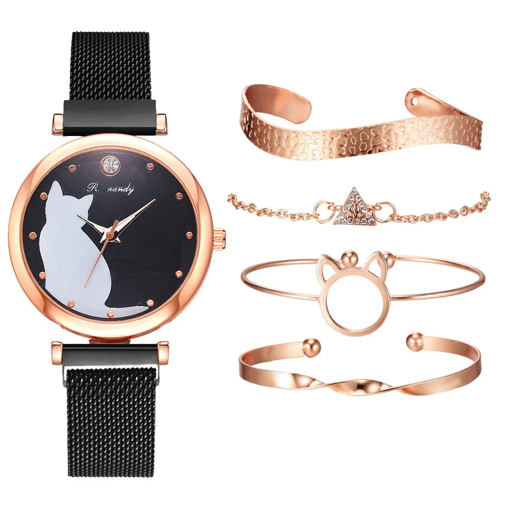 Rose gold watch with black mesh strap and cat silhouette dial, with four matching rose gold bracelets