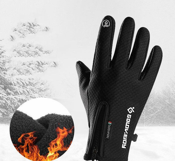 Black winter touchscreen gloves with zipper and fire-resistant inner lining in snowy outdoor setting