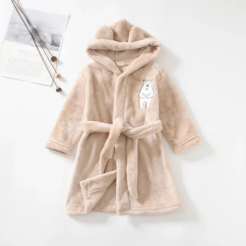 Beige soft plush hooded children's bathrobe with bear embroidery and belt on white background