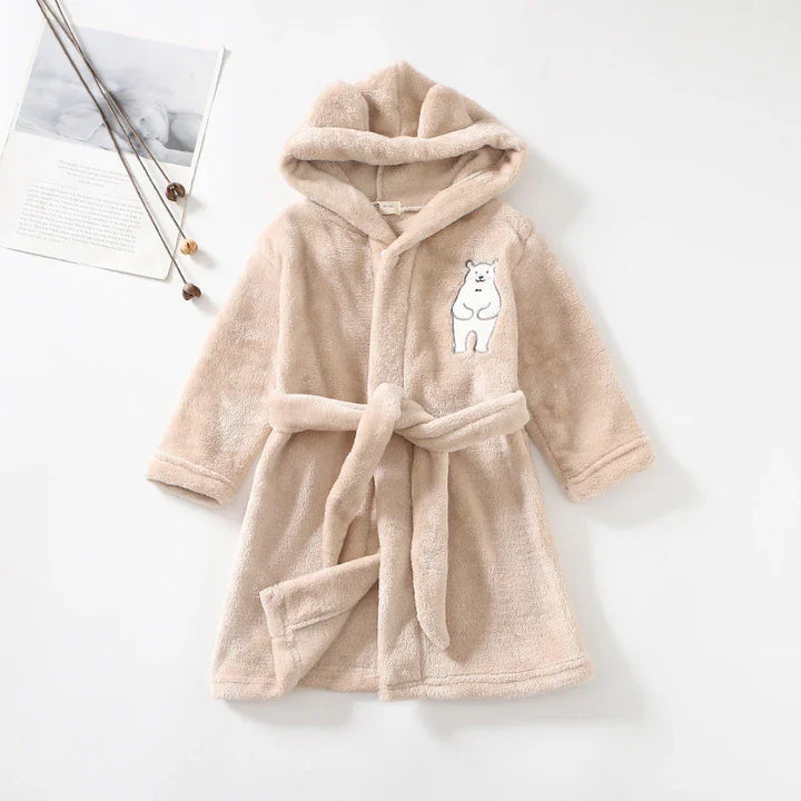 Beige soft plush hooded children's bathrobe with bear embroidery and belt on white background
