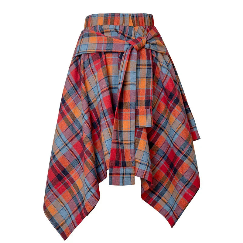 Asymmetric plaid skirt with orange, red, and blue check pattern and attached fabric belt