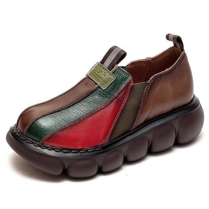 Colorful leather casual shoe with chunky brown cushioned sole and elastic side panels