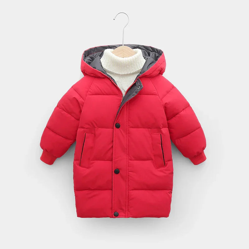 Red padded children's winter coat with hood and front pockets on hanger over white turtleneck sweater