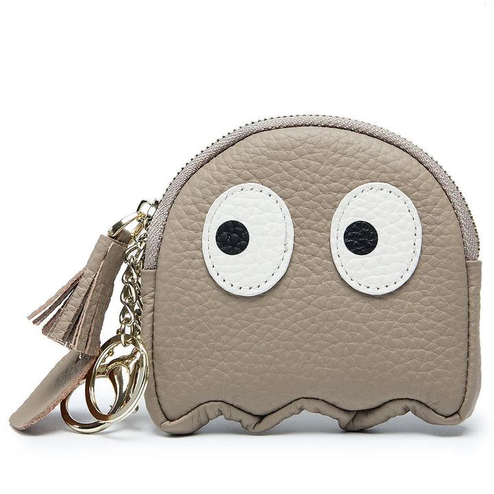Beige faux leather coin purse with large googly eyes and gold keychain accessories