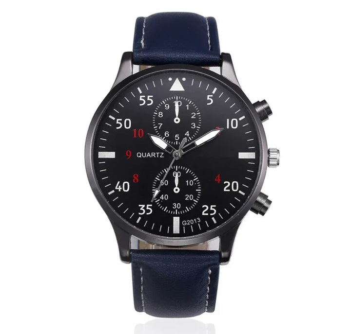 Black dial quartz wristwatch with blue leather strap and dual chronograph subdials