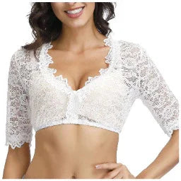Woman wearing white lace crop top with 3/4 sleeves and scalloped edges, smiling
