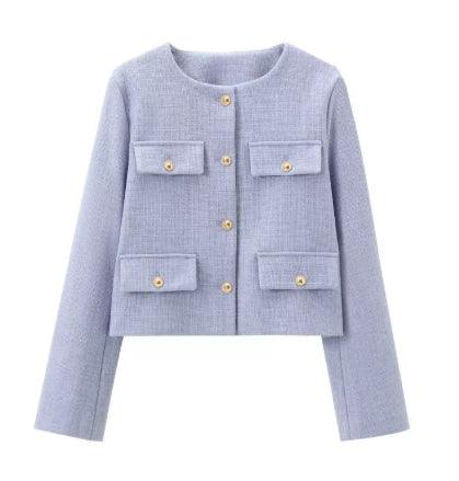 Light purple textured women's jacket with round neckline, gold buttons, and four front pockets