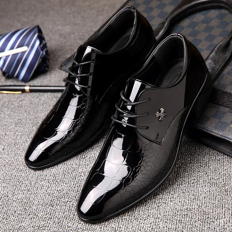 Glossy black men's dress shoes with laces and reptile texture detail on gray carpet