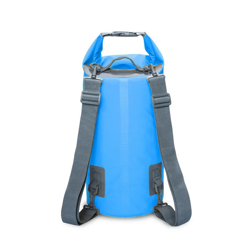 Blue waterproof dry bag backpack with adjustable gray straps and buckle closure