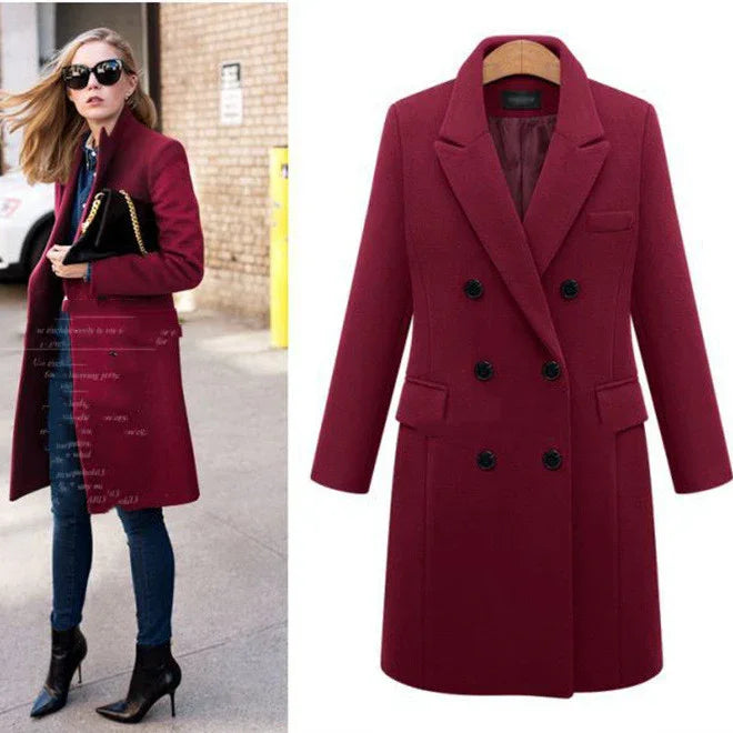 Stylish woman wearing a burgundy double-breasted wool coat with black buttons, paired with jeans and black ankle boots