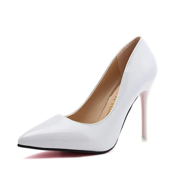 Elegant white patent leather pointed-toe high heel pump with light pink stiletto heel