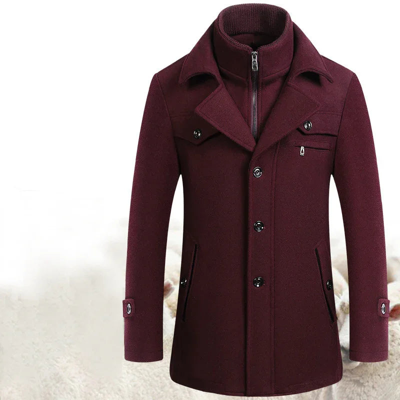 Stylish maroon men's wool blend winter coat with button and zipper closure, flap pockets, and a high collar