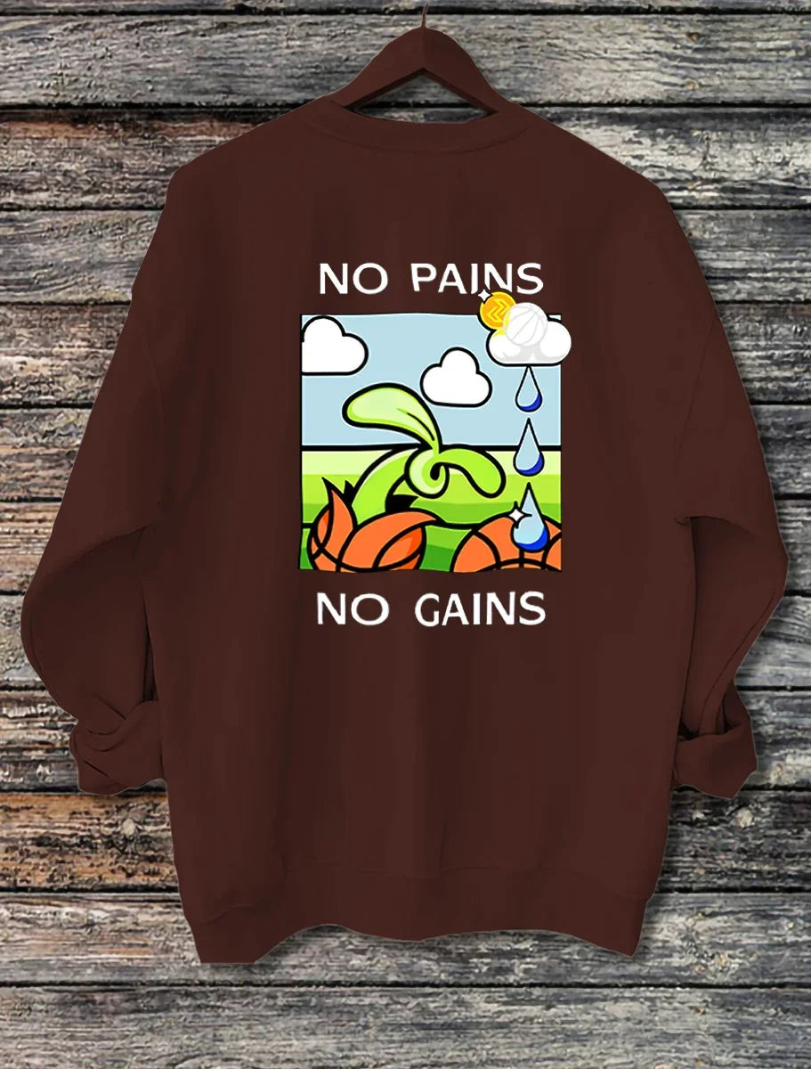 Brown sweatshirt with cartoon plant graphic and text 'No Pains No Gains' hanging on wooden background