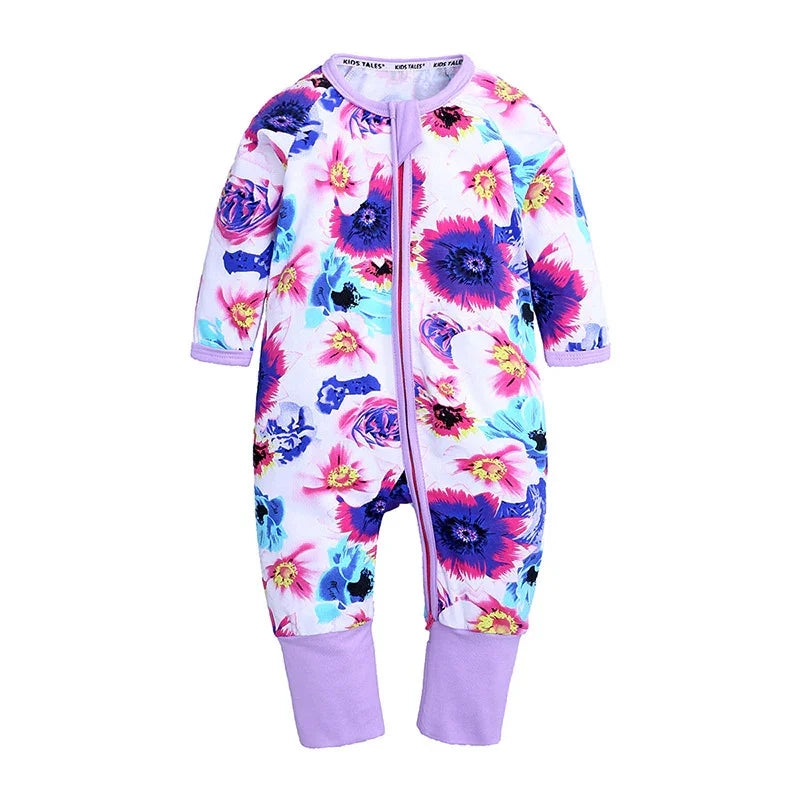 Baby floral print onesie with purple trim and cuffs, long sleeves, zipper front closure
