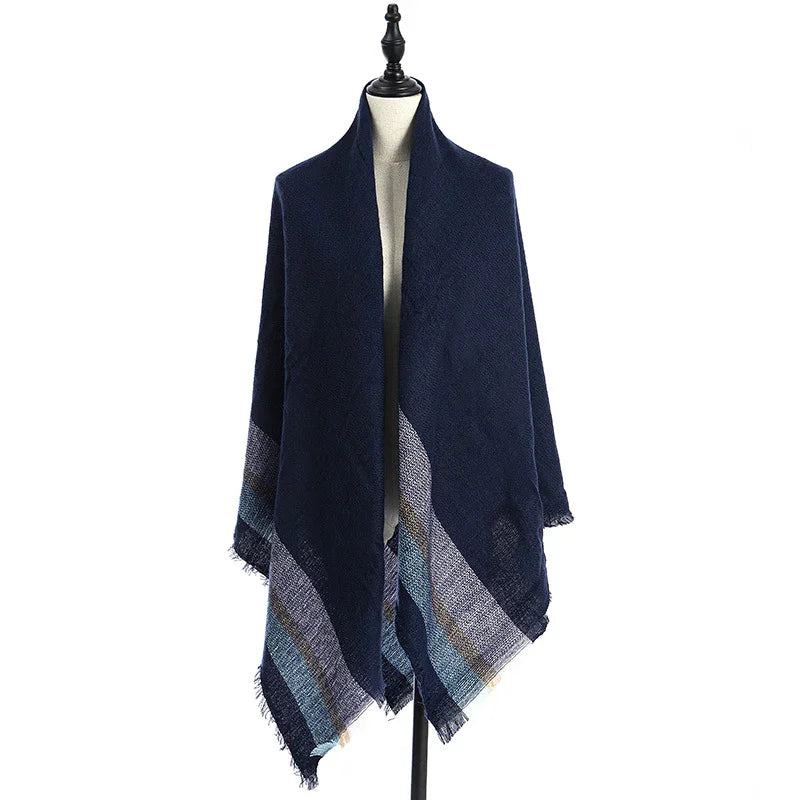 Navy blue soft textured shawl with multicolor stripes on edges displayed on mannequin