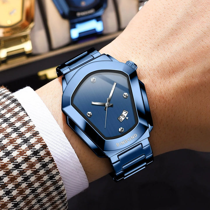 Men's stylish blue metallic wristwatch with hexagonal dial and date display on wrist