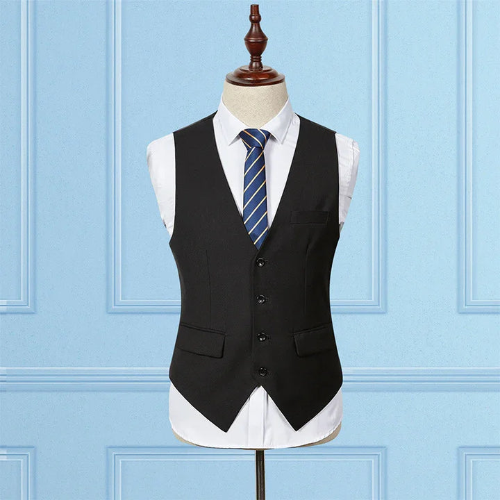 Black men's formal waistcoat with buttons over white shirt and blue striped tie on mannequin