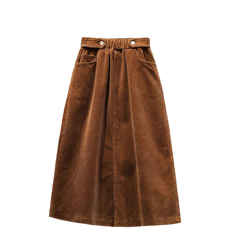 brown corduroy midi skirt with buttoned waist and front pockets on white background