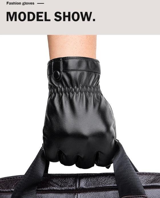 Close-up of black leather fashion glove worn on hand holding textured black bag handle
