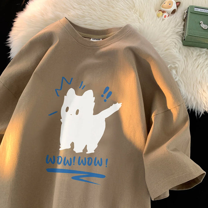 Brown T-shirt with white cartoon cat print and blue text WOW! WOW! on furry surface