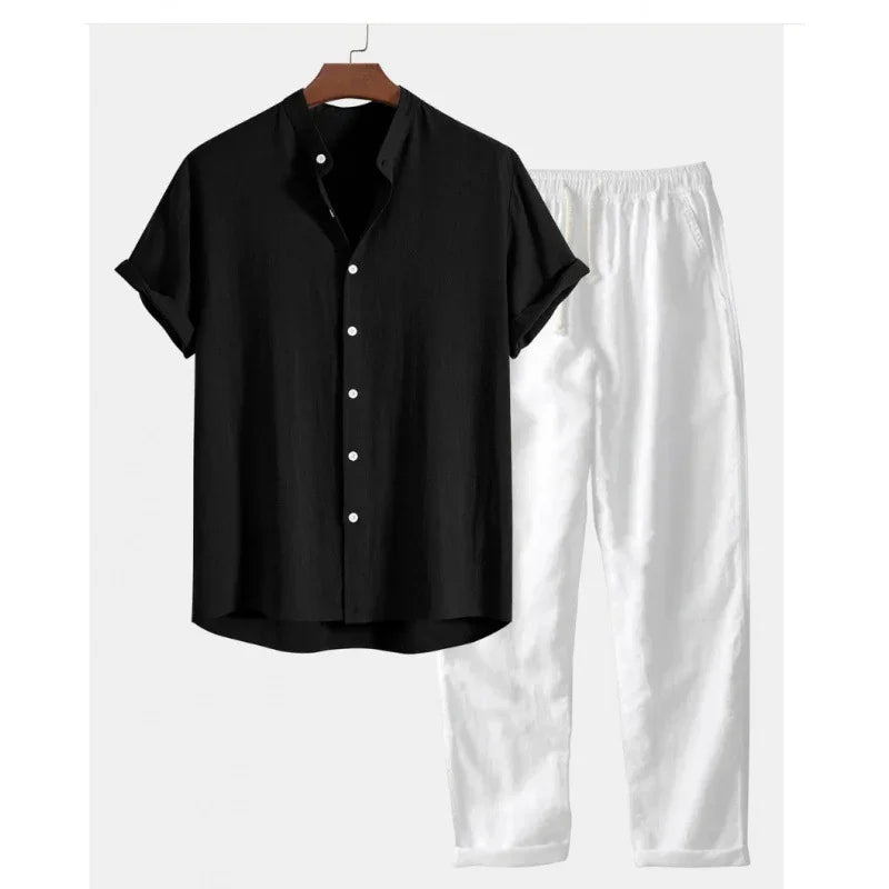 Black short sleeve button-up shirt and white elastic waist pants casual outfit