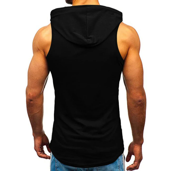 Rear view of muscular man wearing black sleeveless hoodie and blue jeans