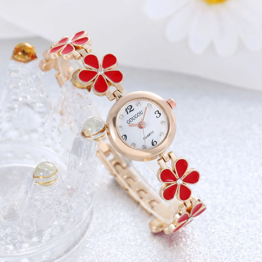 Elegant gold-tone quartz wristwatch with red flower links and white dial by GouGou