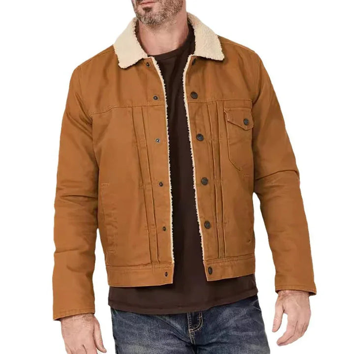 Men's brown canvas jacket with white sherpa collar and button closure, styled casual